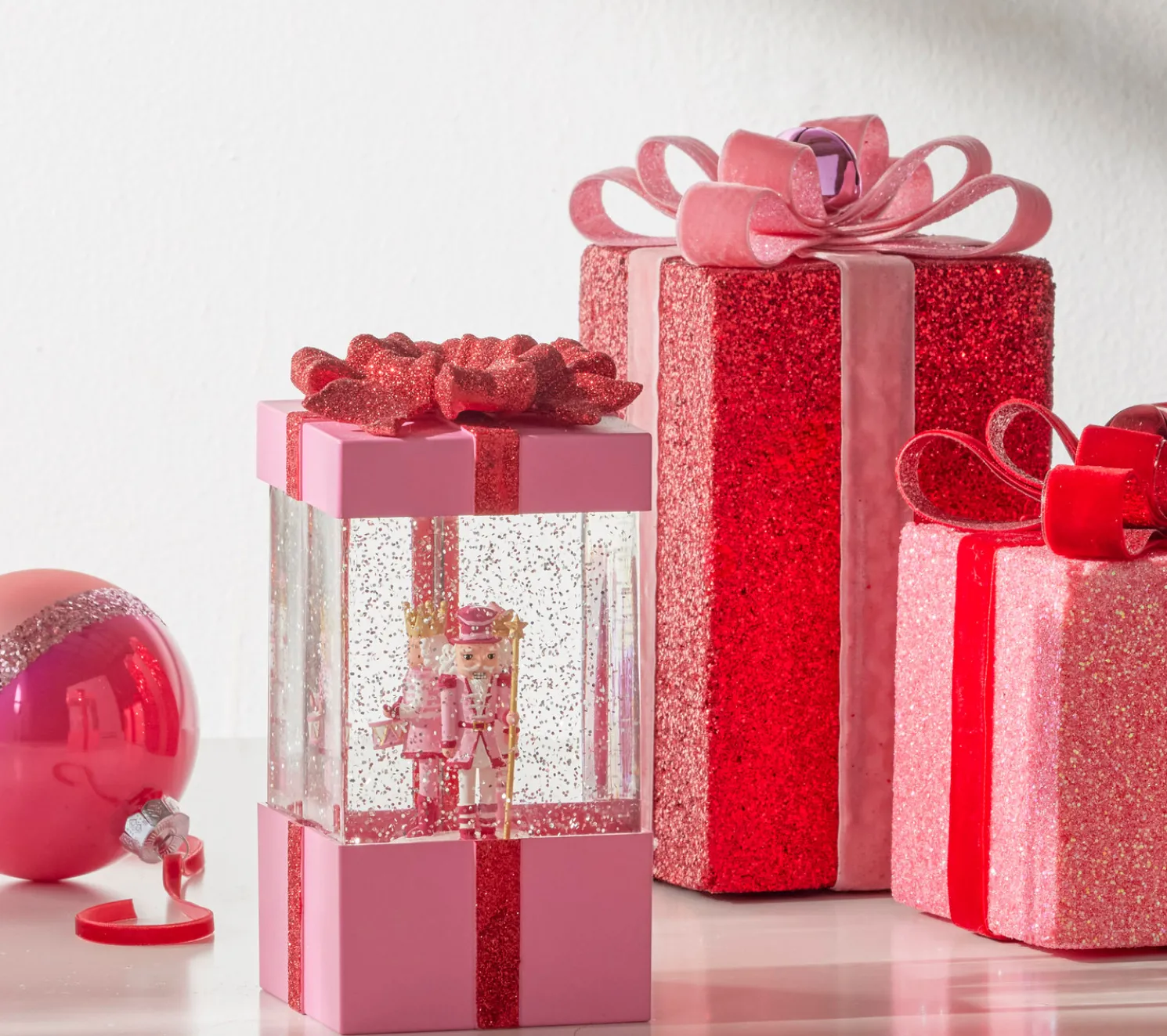 Raz 7.75" Blushing Pink Christmas Present Water Globe with Nutcracker 4400758