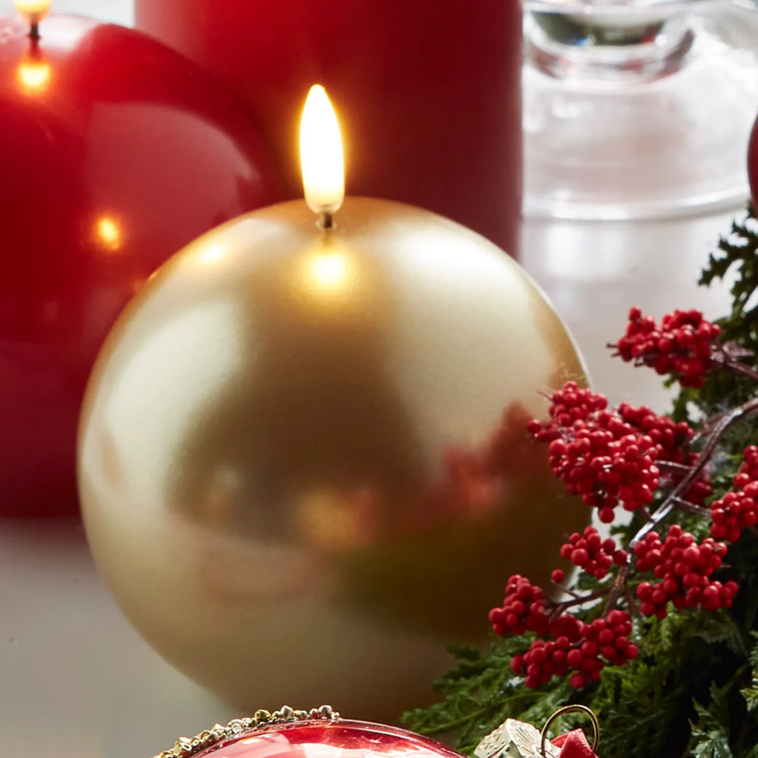 Raz 4" Uyuni Metallic Gold Round Battery Operated Candle with Lighted Flickering Wick 4434506