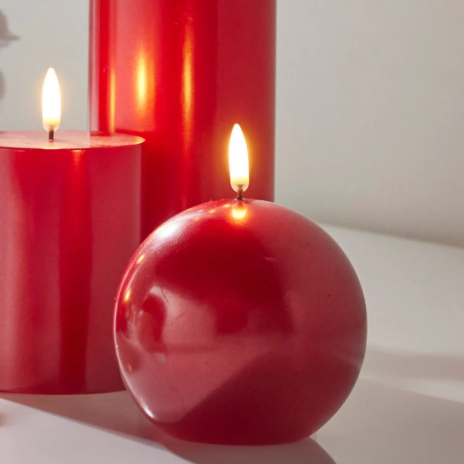 Raz 4" Uyuni Metallic Red Round Battery Operated Candle with Lighted Flickering Wick 4434528