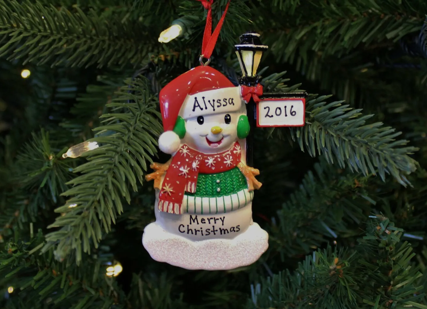 Snowman Standing By A Light Post Personalized Christmas Ornament