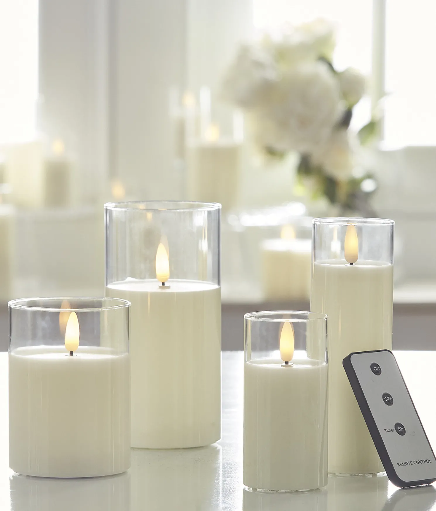Uyuni Moving Flame Clear Glass Ivory Pillar Battery Candle
